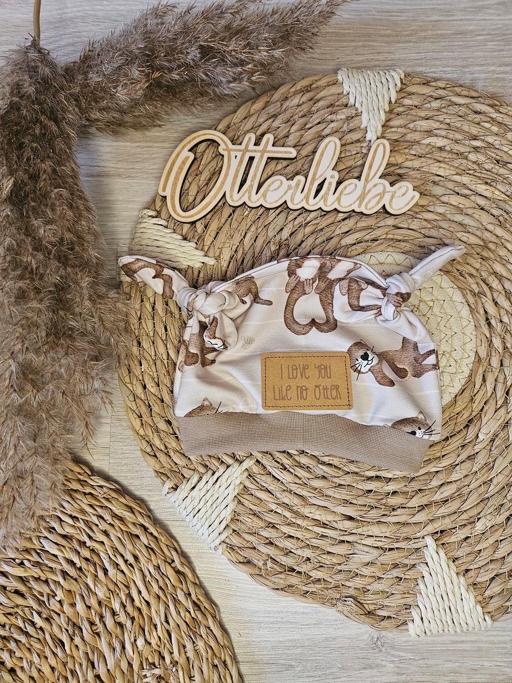 Baby Knoten-Mütze "Otterliebe" handgemacht aus French Terry, 95% Baumwolle 5% Elasthan – passend zur Strampler-Kollektion | Little Falili
