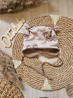 Baby Öhrchen-Mütze "Olli Otter" handgemacht aus French Terry & Jersey, 95% Baumwolle 5% Elasthan – passend zum Olli Otter-Strampler | Little Falili
