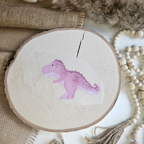 "Dino rosa" Bügelbild zum Aufbügeln – niedlicher türkis-blauer T-Rex im Aquarellstil auf Holzscheibe, handmade | Little Falili
